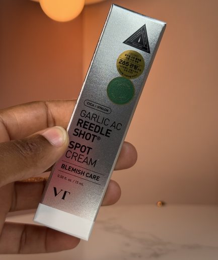 VT Cosmetics Garlic AC Reedle Shot Spot Cream 15ml held in hand