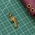 Gold Tone Folio Charms - Bow