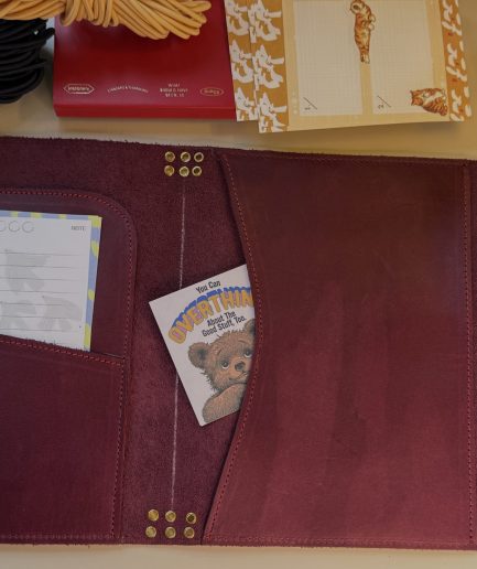 plum leather folio interior pockets on display - FORTÉ x Penelope Leather Folio collaboration